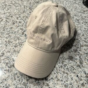 Kith “the arrogance” hat in tan/off white